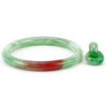 Chinese green jade bangle and pendant with unmarked gold mount, the bangle 8cm in diameter, total