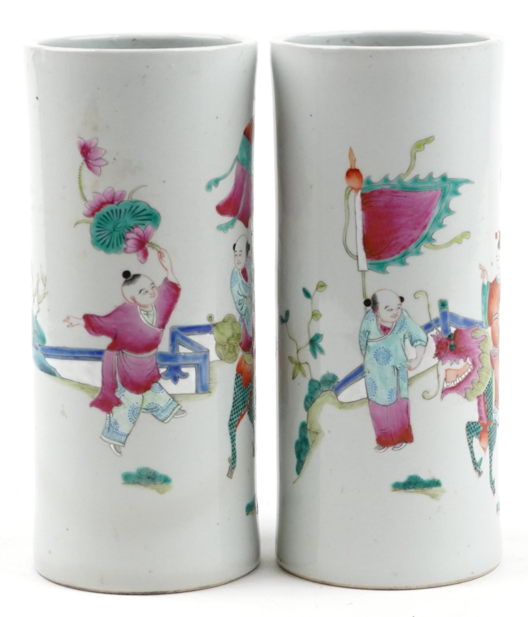 Pair of Chinese porcelain cylindrical vases hand painted in the famille rose palette with a family - Image 4 of 6