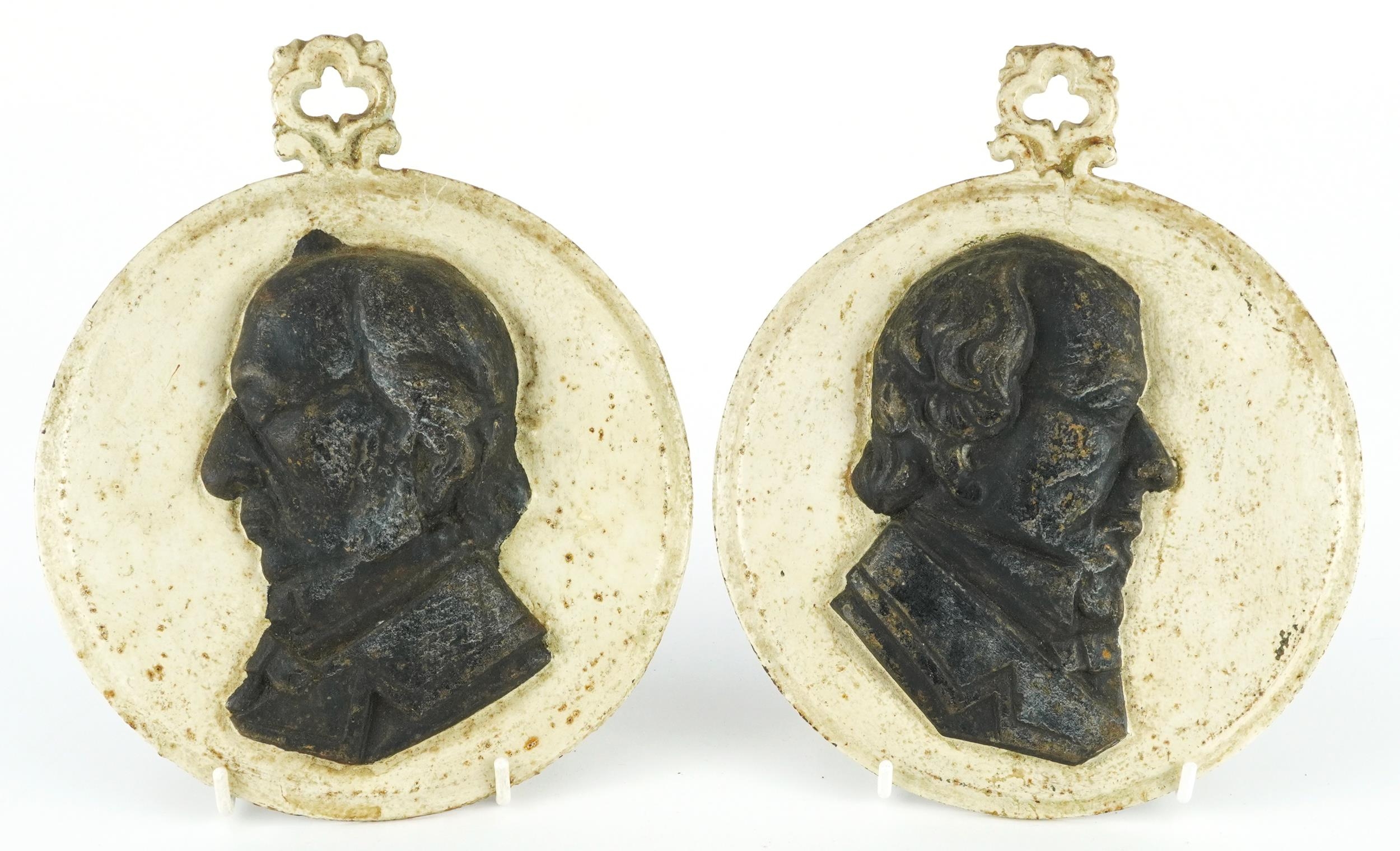 Pair of 19th century cast iron portrait plaques comprising William Gladstone and Benjamin Dizrali,