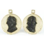 Pair of 19th century cast iron portrait plaques comprising William Gladstone and Benjamin Dizrali,