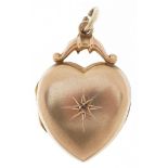 9ct gold love heart locket set with a diamond, 2.5cm high, 3.5g