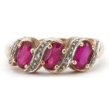9ct gold ruby and diamond crossover ring size J, 1.9g