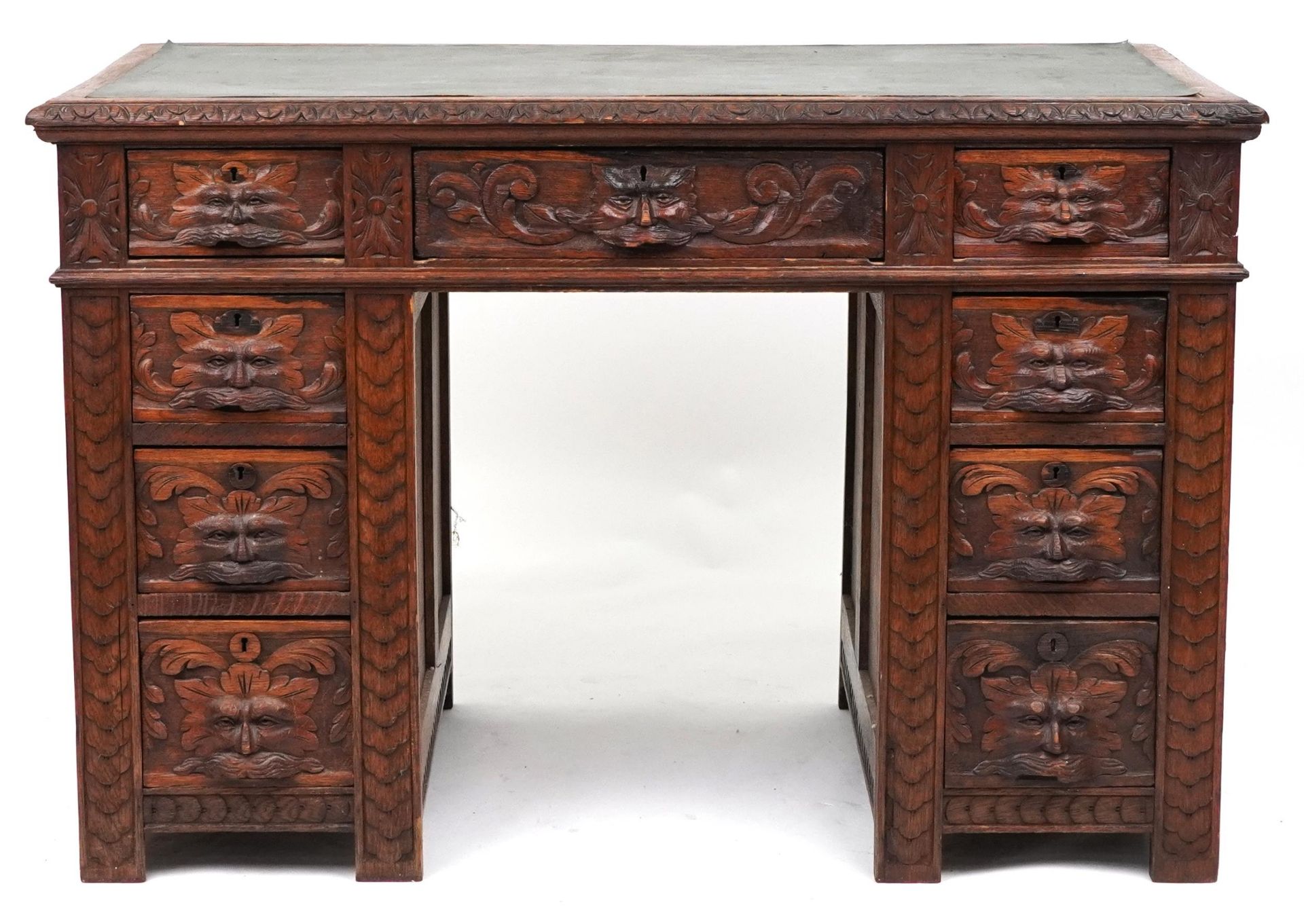 Victorian oak twin pedestal desk carved with a green man masks, fitted with an arrangement of nine - Image 2 of 5