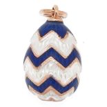 14ct gold blue and white guilloche enamel egg pendant, impressed Russian marks to the suspension