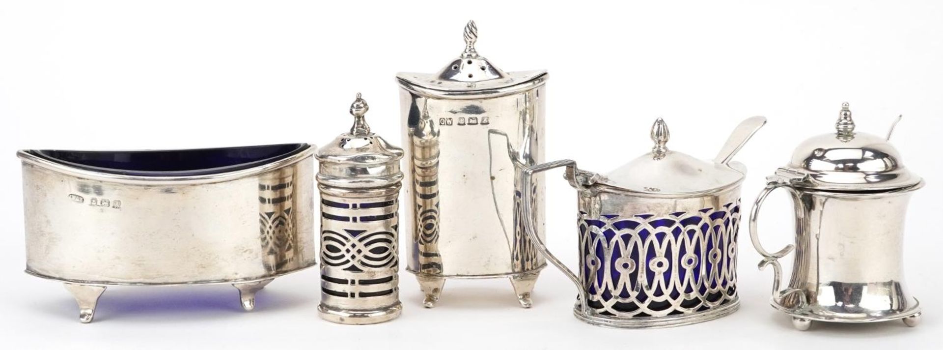 Five Art Deco and later silver cruet items, four with blue glass liners, the largest 9cm wide, - Image 4 of 7