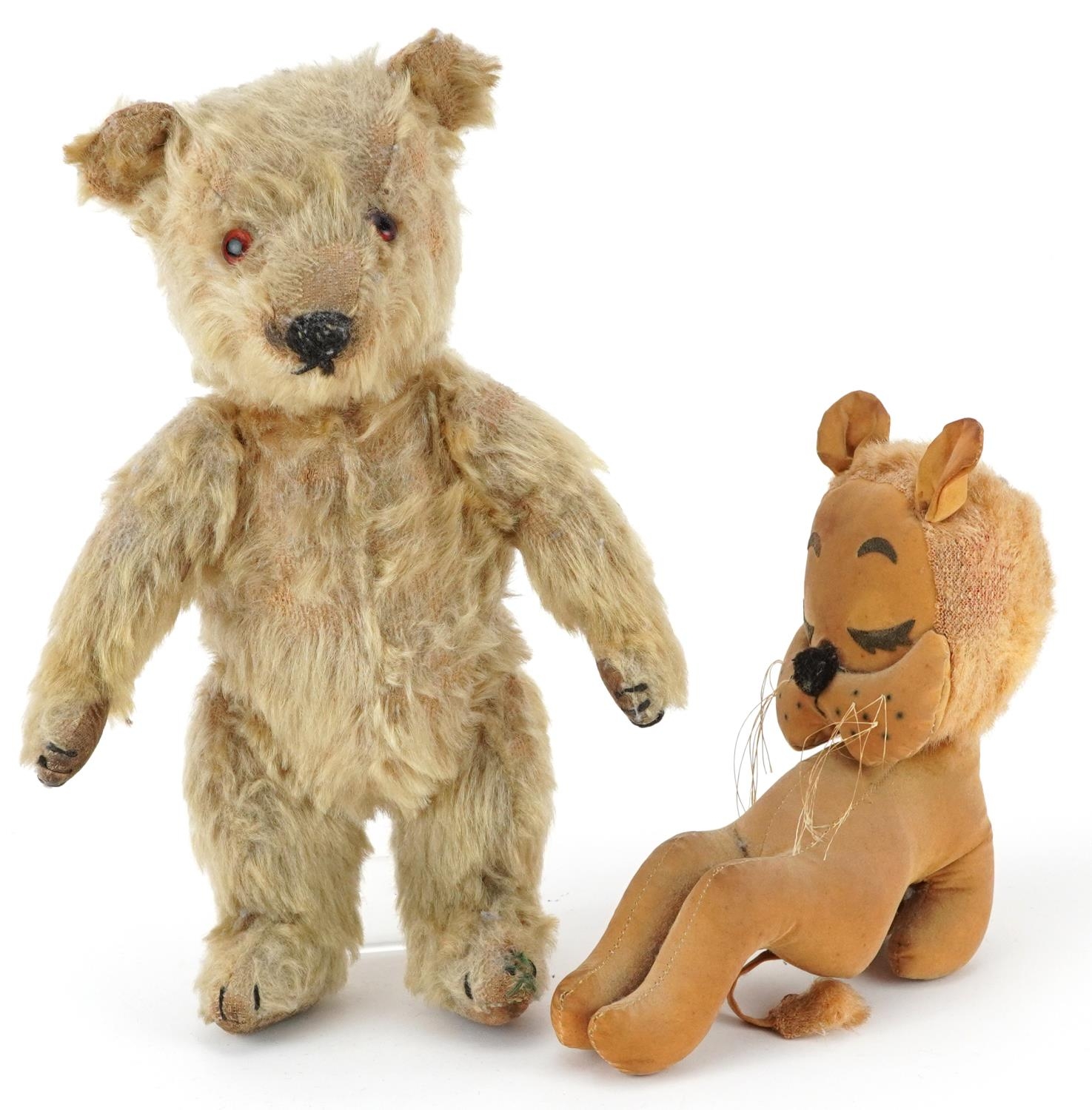 Two vintage teddy bears including a jointed example with beaded eyes, the largest 30.5cm high