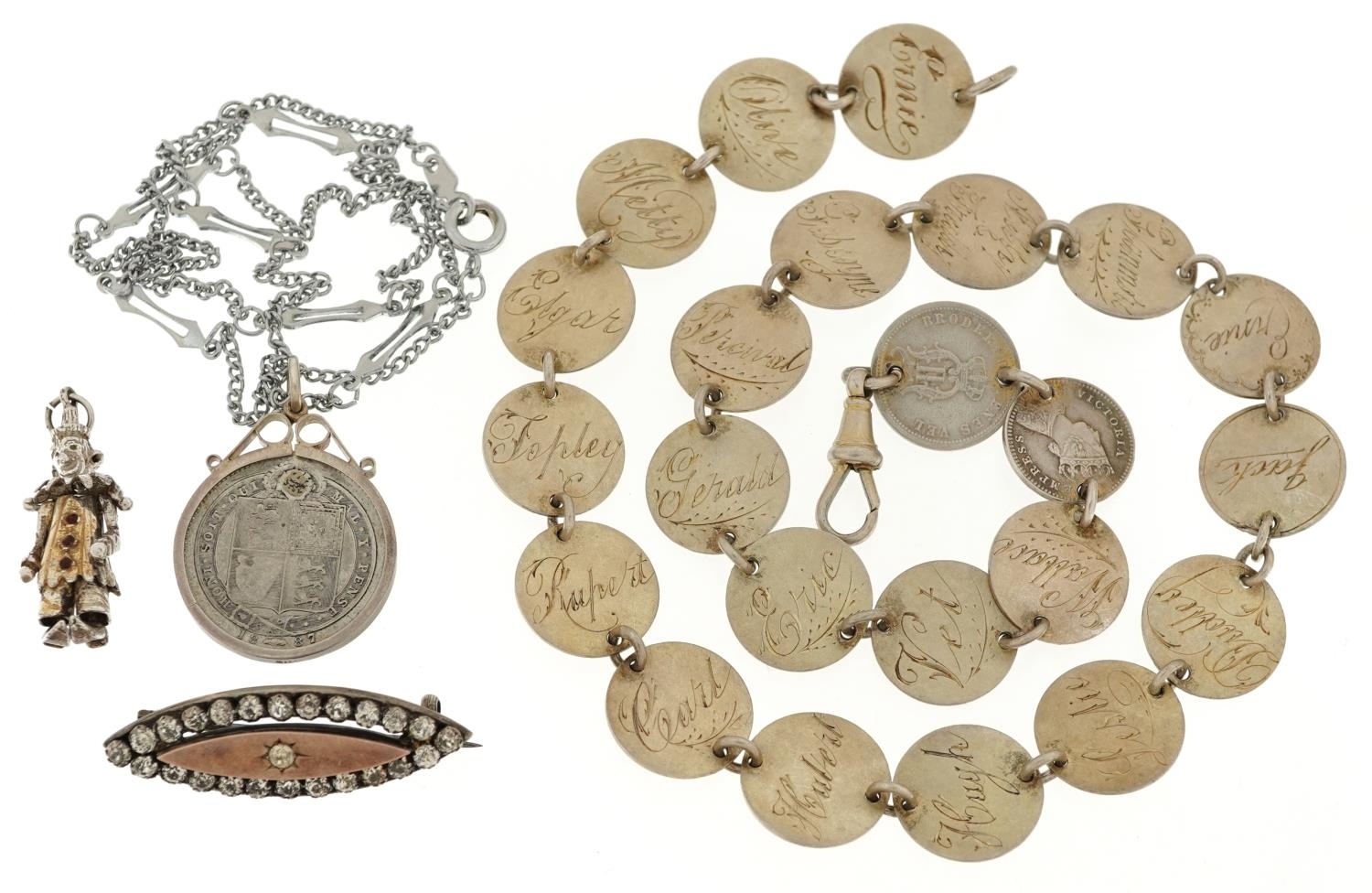 Antique and later silver jewellery including a Victorian coin necklace, articulated clown pendant