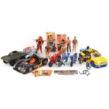 Collection of vintage and later Action Man toys including action figures and vehicles