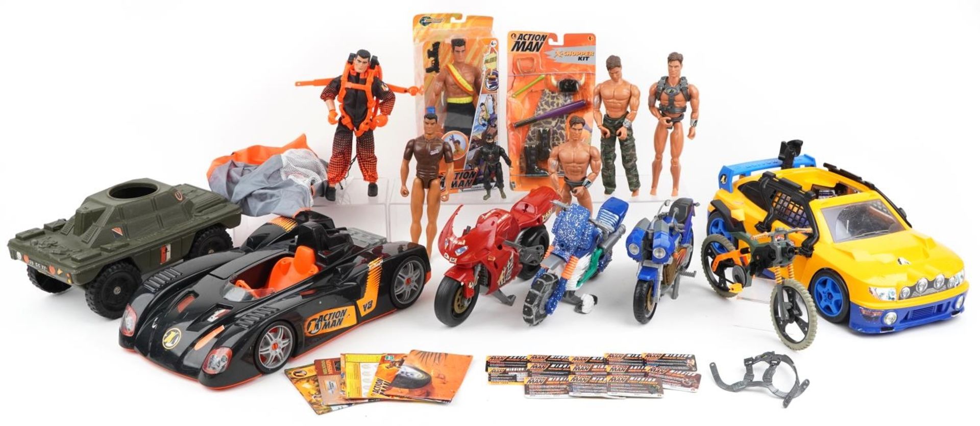 Collection of vintage and later Action Man toys including action figures and vehicles