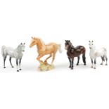 Four Beswick collectable horses including a galloping Palomino numbered 1374, Welsh Mountain pony