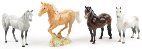 Four Beswick collectable horses including a galloping Palomino numbered 1374, Welsh Mountain pony