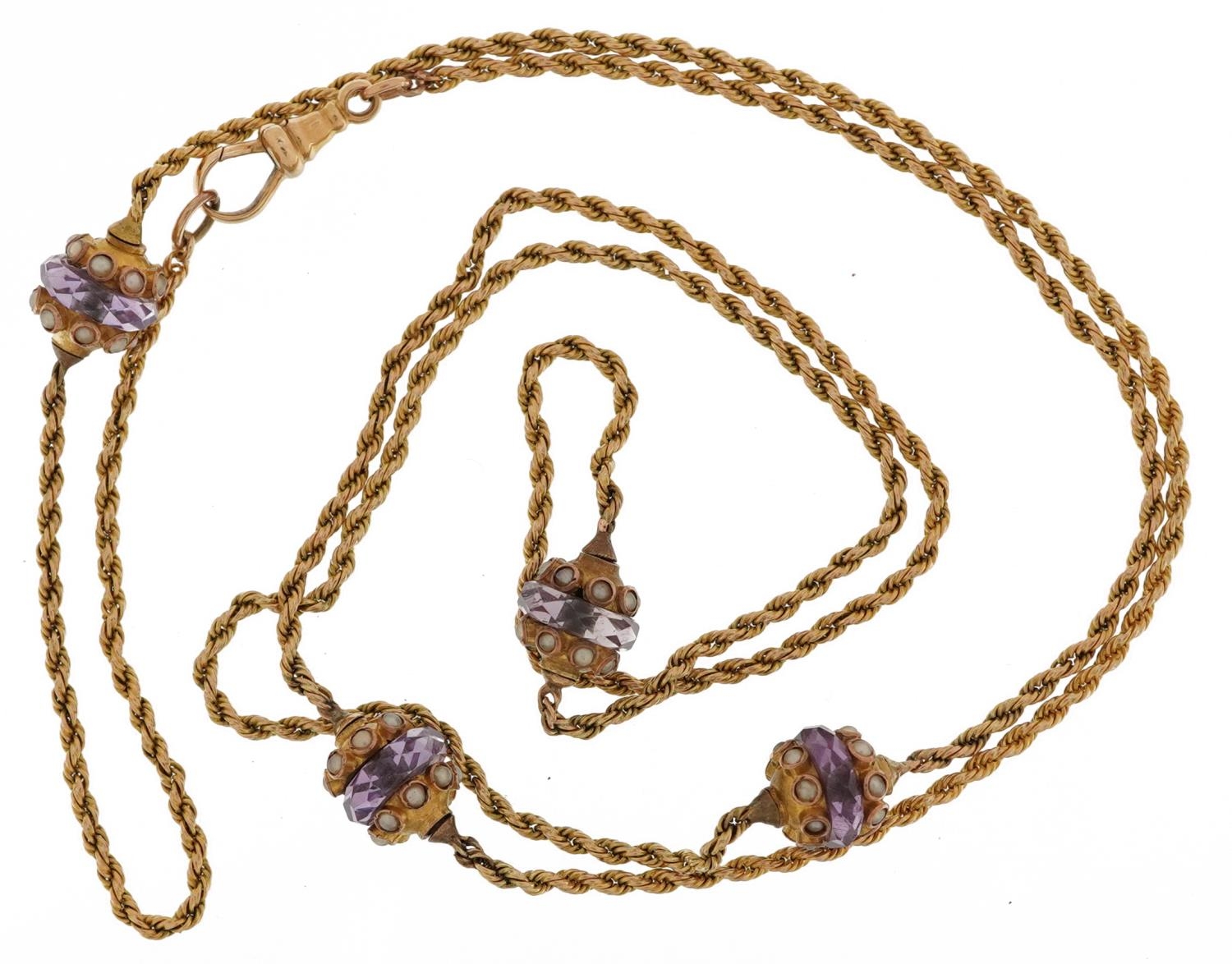 Unmarked gold amethyst and seed pearl rope twist necklace, tests as 9ct gold, 60cm in length, 7.7g - Image 2 of 2