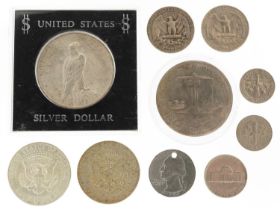United States of America coinage including 1923 silver dollar, half dollars and quarter dollars