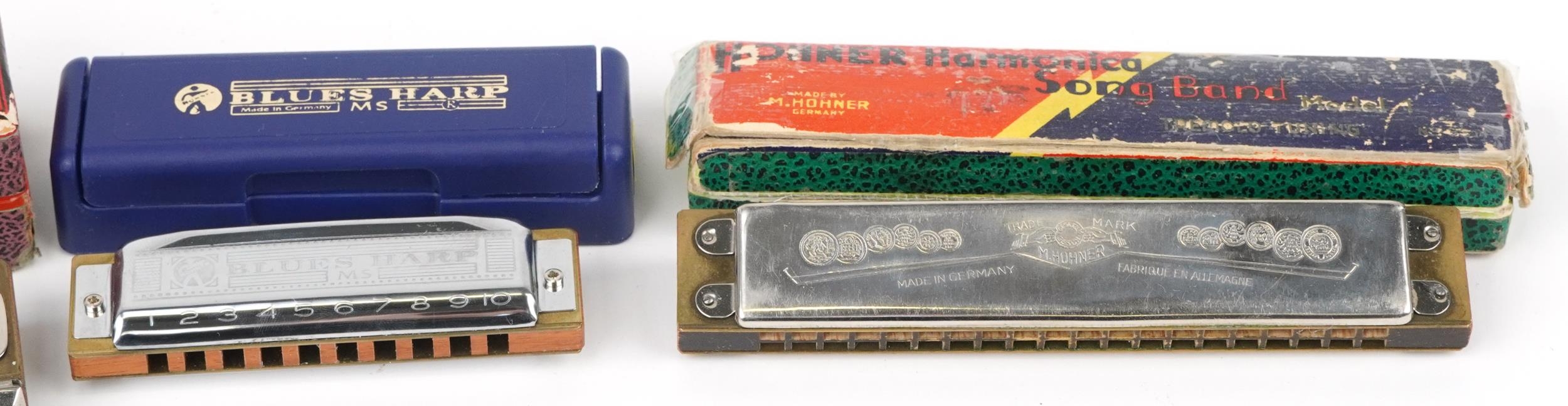 Four vintage and later harmonicas with cases comprising Hero, Blues Harp and two M Hohners - Image 3 of 5