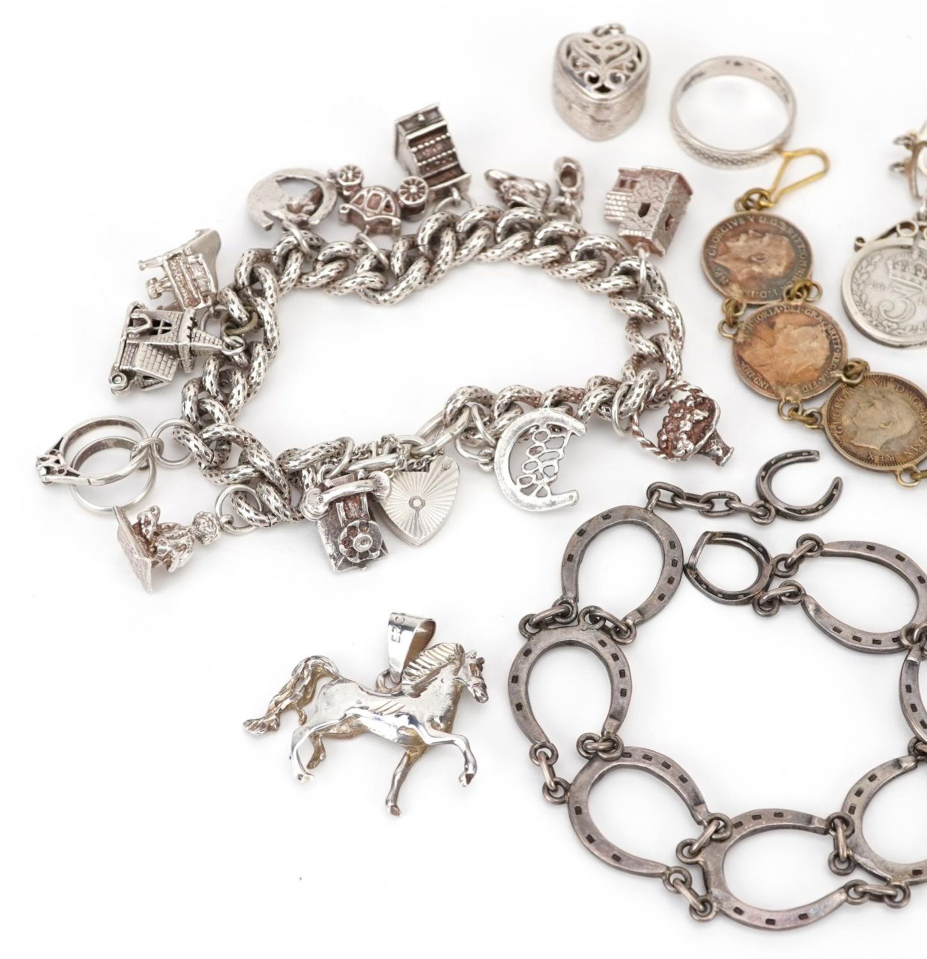 Silver jewellery including a charm bracelet with a collection of silver charms, lucky horseshoe - Image 2 of 5