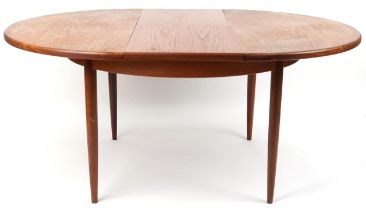 G Plan, mid century teak Fresco extending dining table, 73cm high x 121cm in diameter when closed