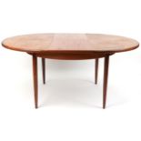 G Plan, mid century teak Fresco extending dining table, 73cm high x 121cm in diameter when closed