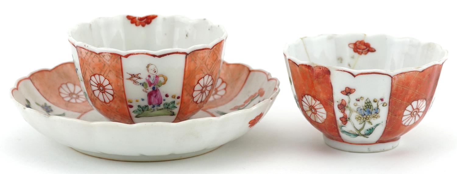 Chinese famille rose porcelain comprising two tea bowls and a saucer, each hand painted with figures