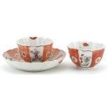 Chinese famille rose porcelain comprising two tea bowls and a saucer, each hand painted with figures