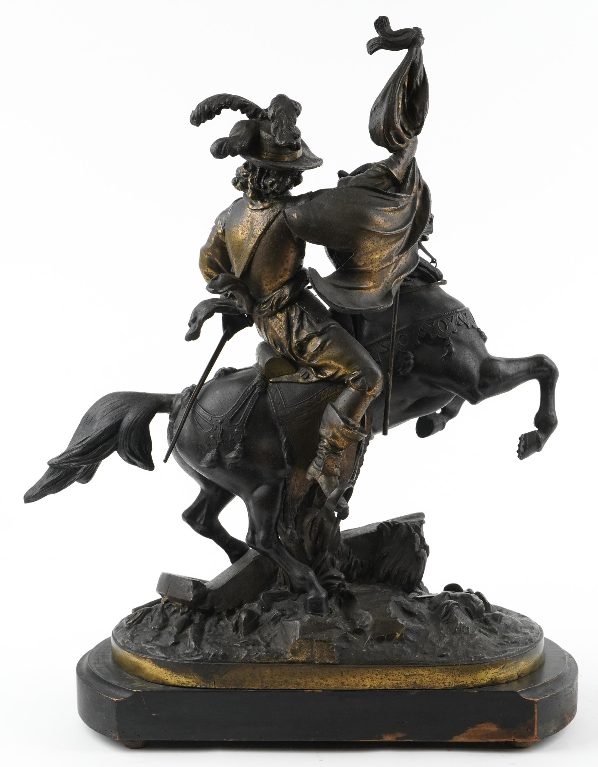Large 19th century classical patinated spelter sculpture of a Cavalier on horseback raised on a - Bild 2 aus 4