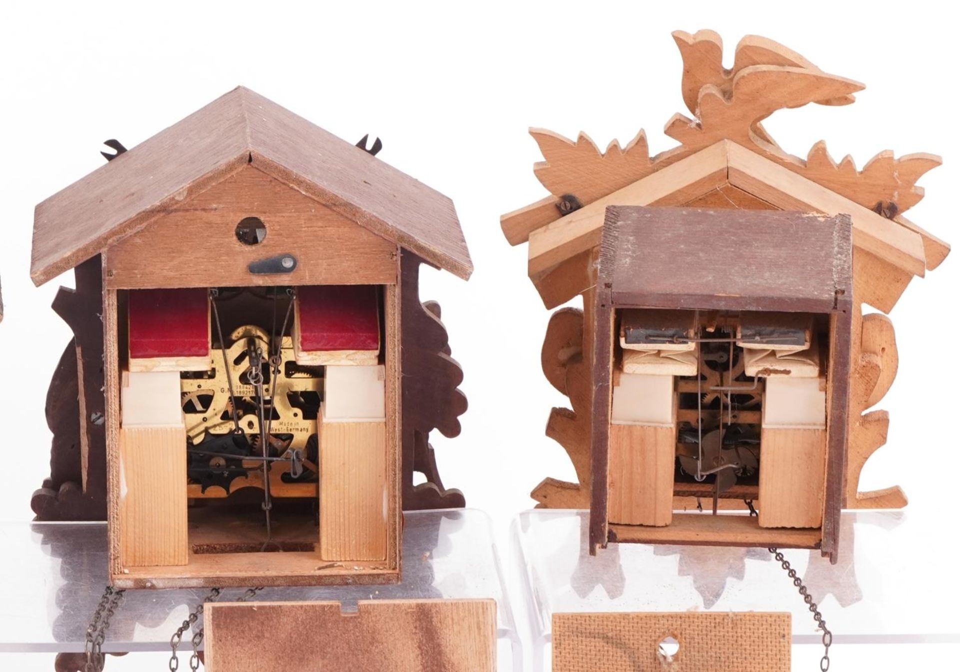 Four German carved Black Forest cuckoo clocks and a Russian USSR example by Veaga, the largest - Image 10 of 10