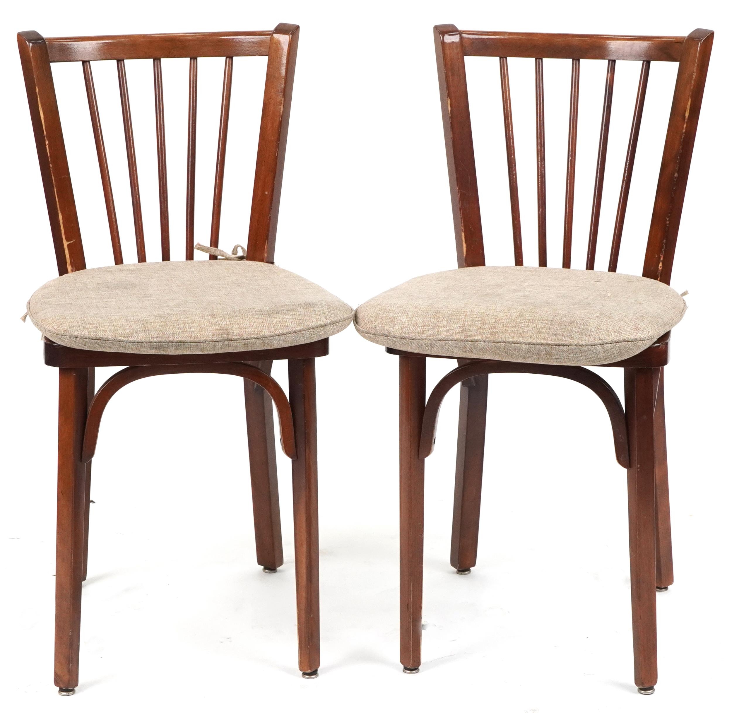 Contemporary circular bistro table with cast iron base and two mahogany chairs with cushions, the - Image 5 of 7