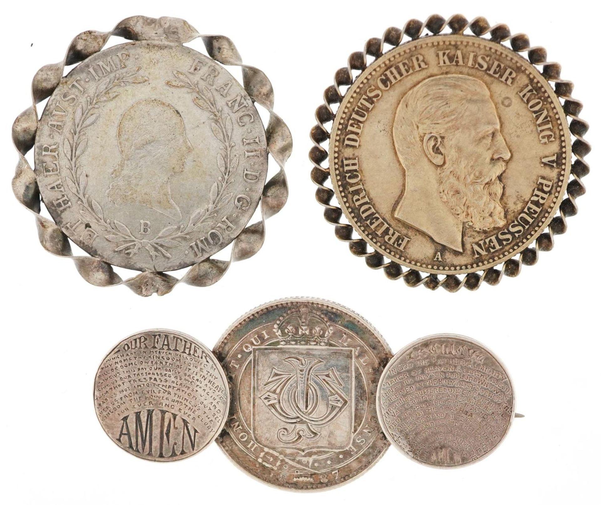 Three antique coin brooches including a Victorian silver three coin brooch engraved with The Lord'