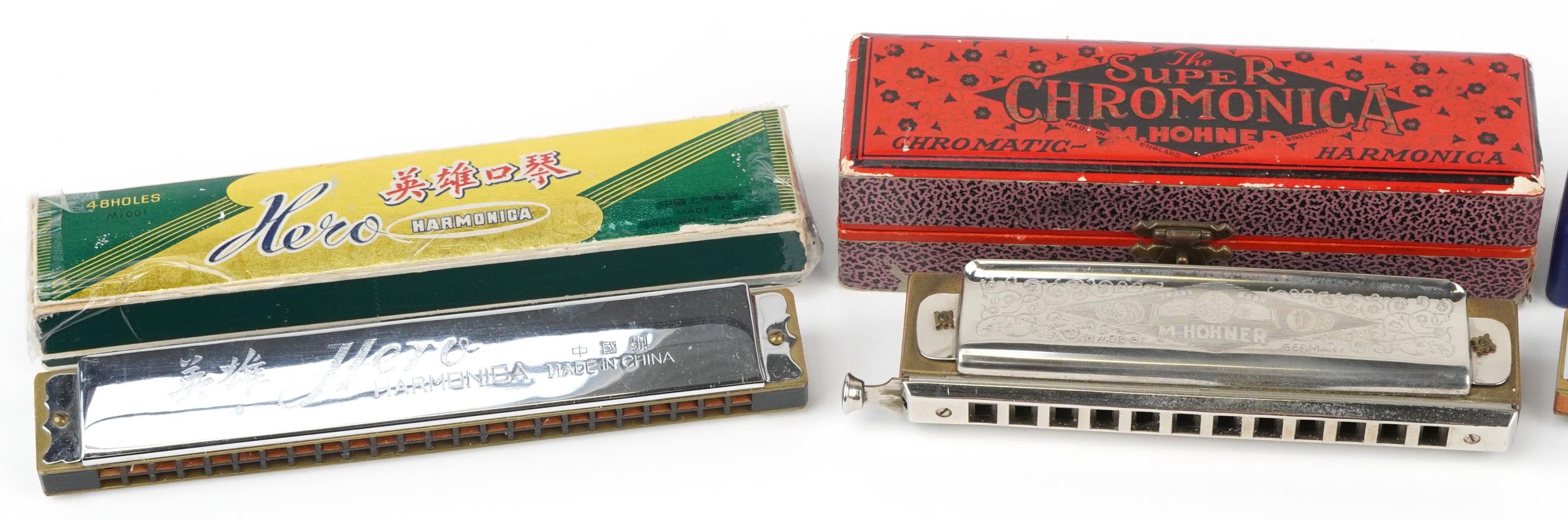 Four vintage and later harmonicas with cases comprising Hero, Blues Harp and two M Hohners - Image 2 of 5