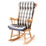 Lightwood rocking chair with check upholstered cushions, 102cm high