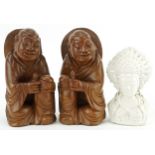 Pair of Chinese hardwood carvings of Buddha and blanc de chine glazed porcelain bust of Guanyin, the