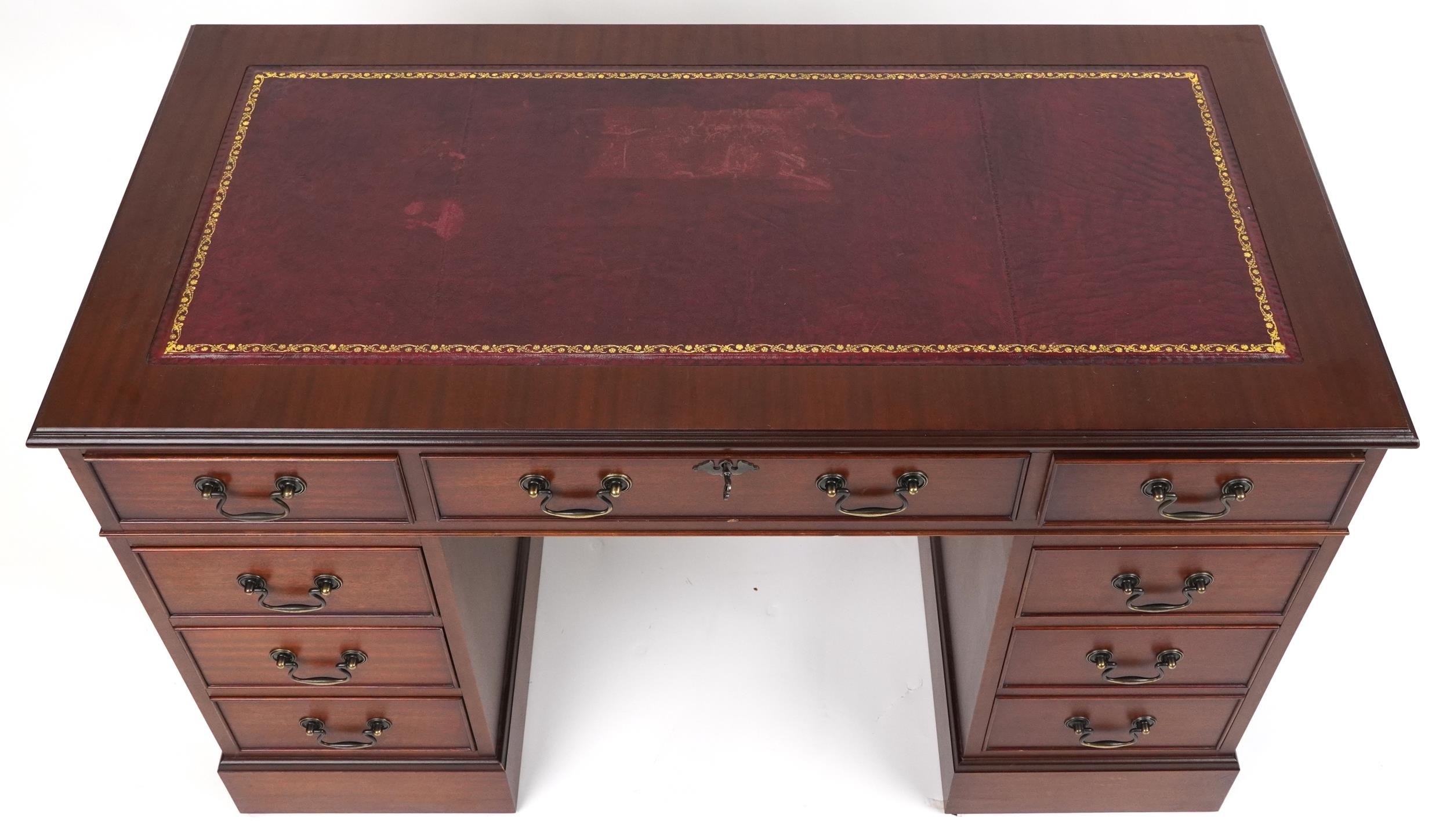 Mahogany twin pedestal desk with red tooled leather insert fitted with an arrangement of nine - Image 2 of 3