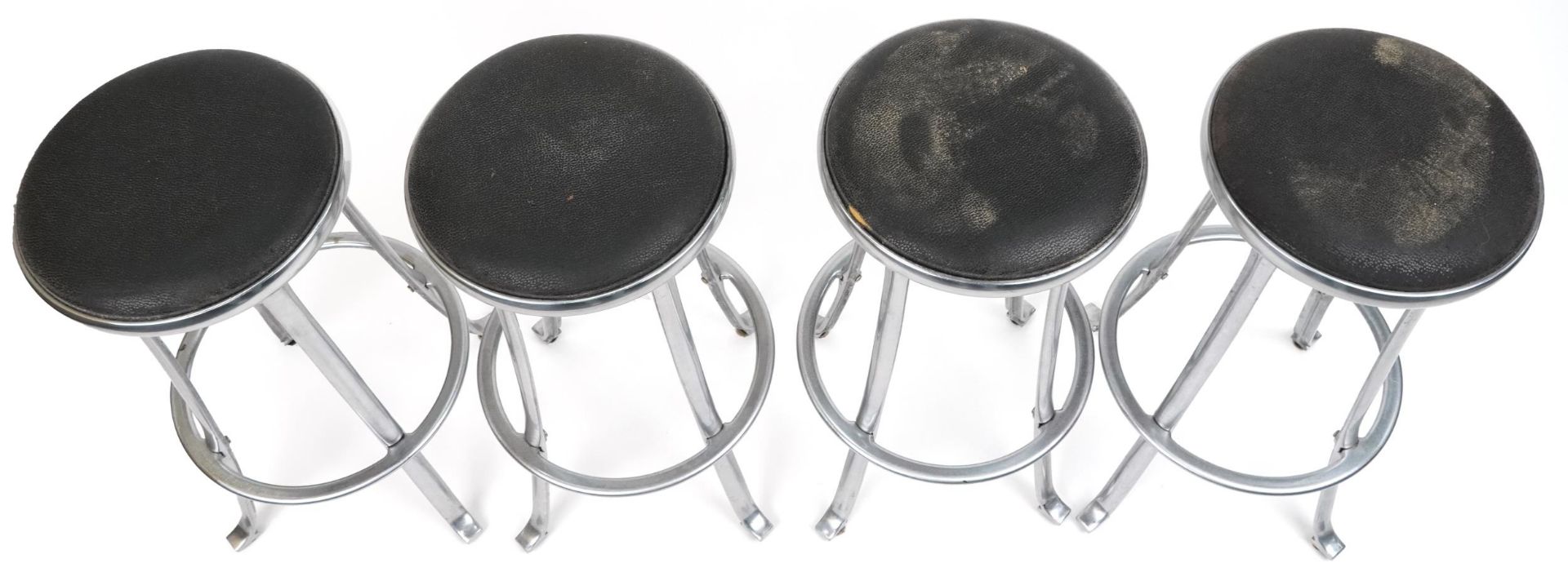 Set of four industrial chromed bar stools with black upholstered cushioned seats, 69cm high - Image 2 of 4