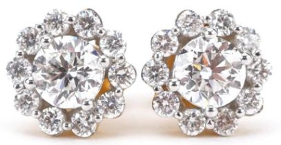 Pair of 18ct gold diamond cluster stud earrings with certificate, total diamond weight approximately