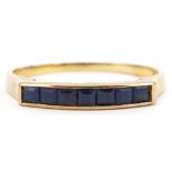 14ct gold sapphire seven stone ring, size O, 1.6g