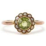 Gold peridot and seed pearl cluster ring, indistinct marks, tests as 15ct gold, the peridot