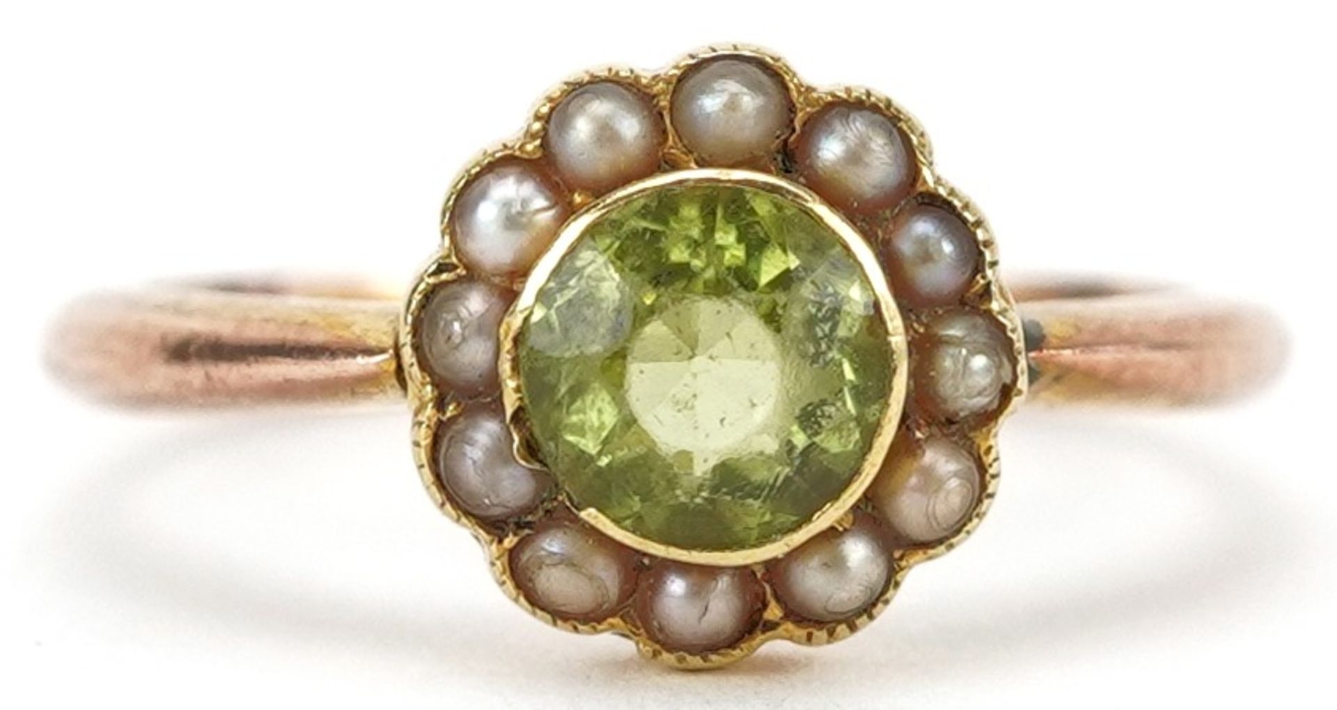 Gold peridot and seed pearl cluster ring, indistinct marks, tests as 15ct gold, the peridot