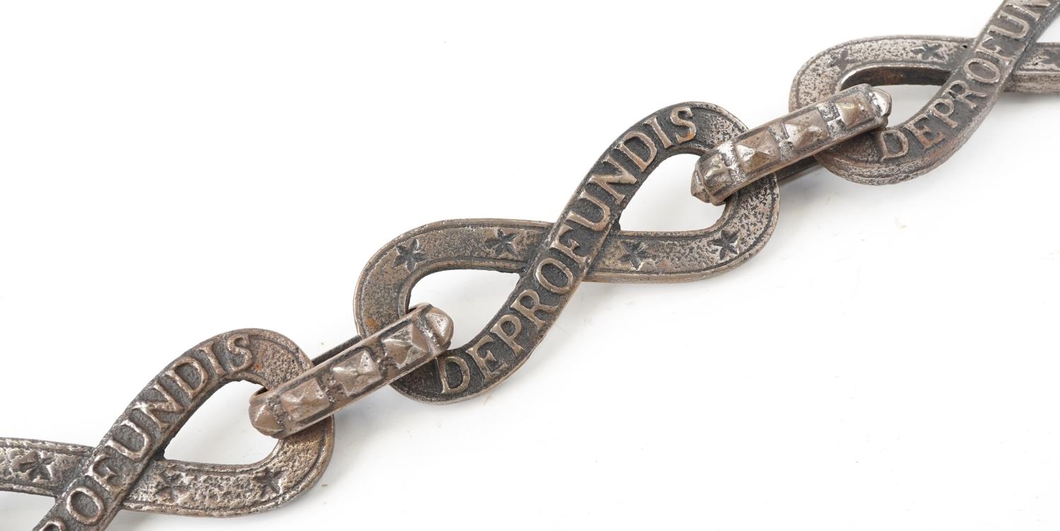 Shipping interest iron chain, possibly part of an anchor chain, each cast with the word Deprofundis,