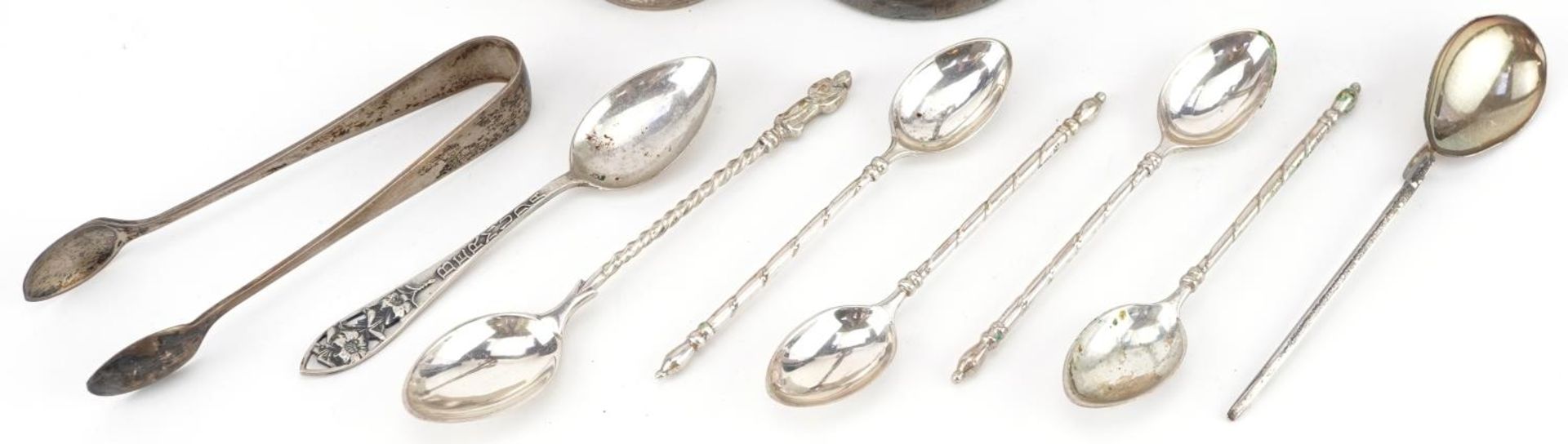 Silver objects comprising seven teaspoons, napkin ring, sugar tongs and bud vase, the largest 19.5cm - Image 3 of 8