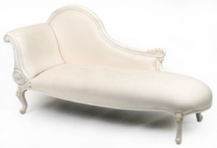 Contemporary French style chaise longue with striped cream upholstery on carved cabriole legs with