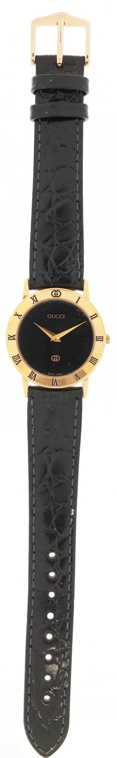 Gucci, ladies gold plated Gucci 3000J quartz wristwatch having Roman numerals to the bezel, serial - Image 2 of 7