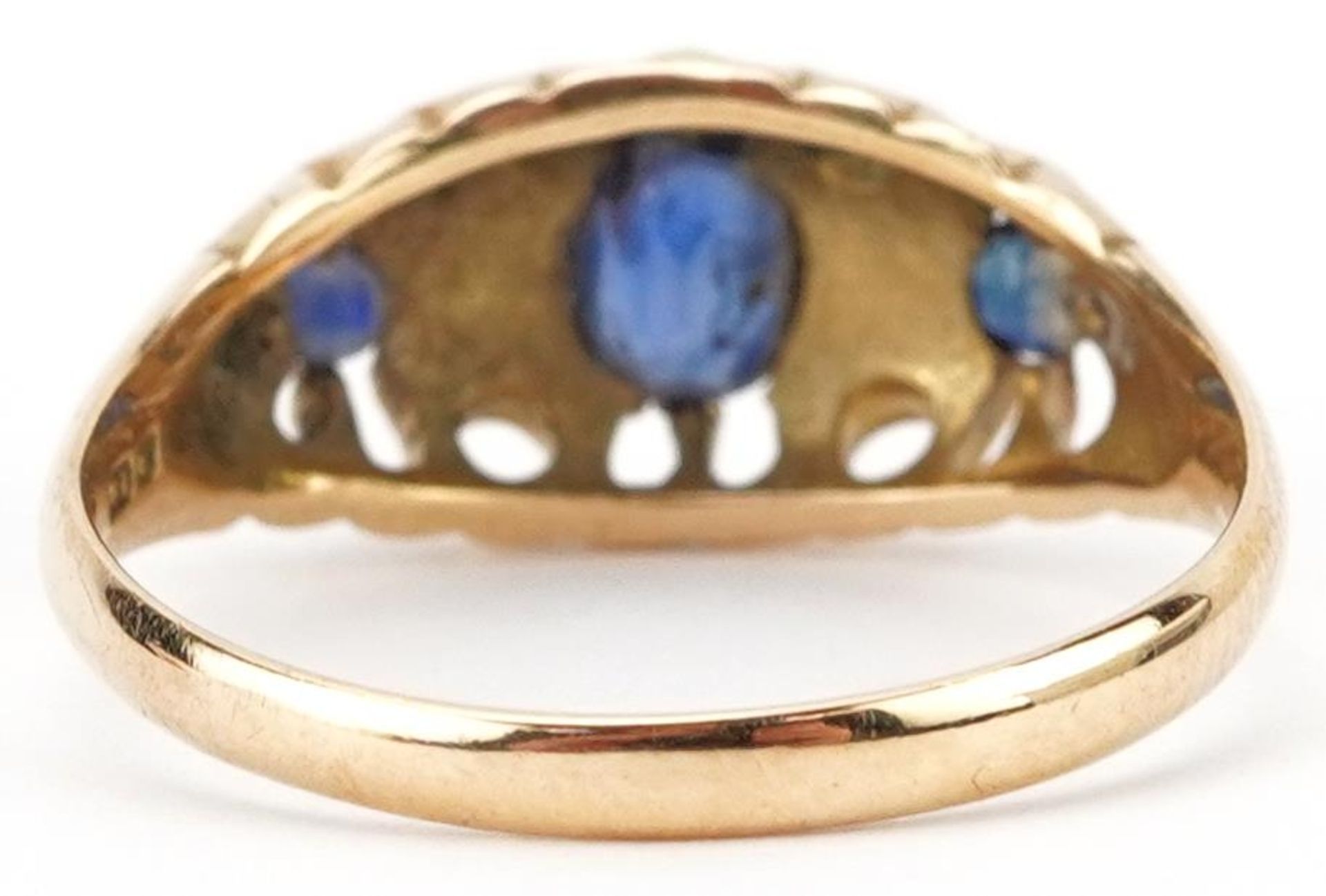 Antique 18ct gold sapphire and diamond seven stone ring with pierced ornate setting, the largest - Image 2 of 5