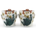 Pair of 19th century continental porcelain comical cache pots in the form of buckets mounted with