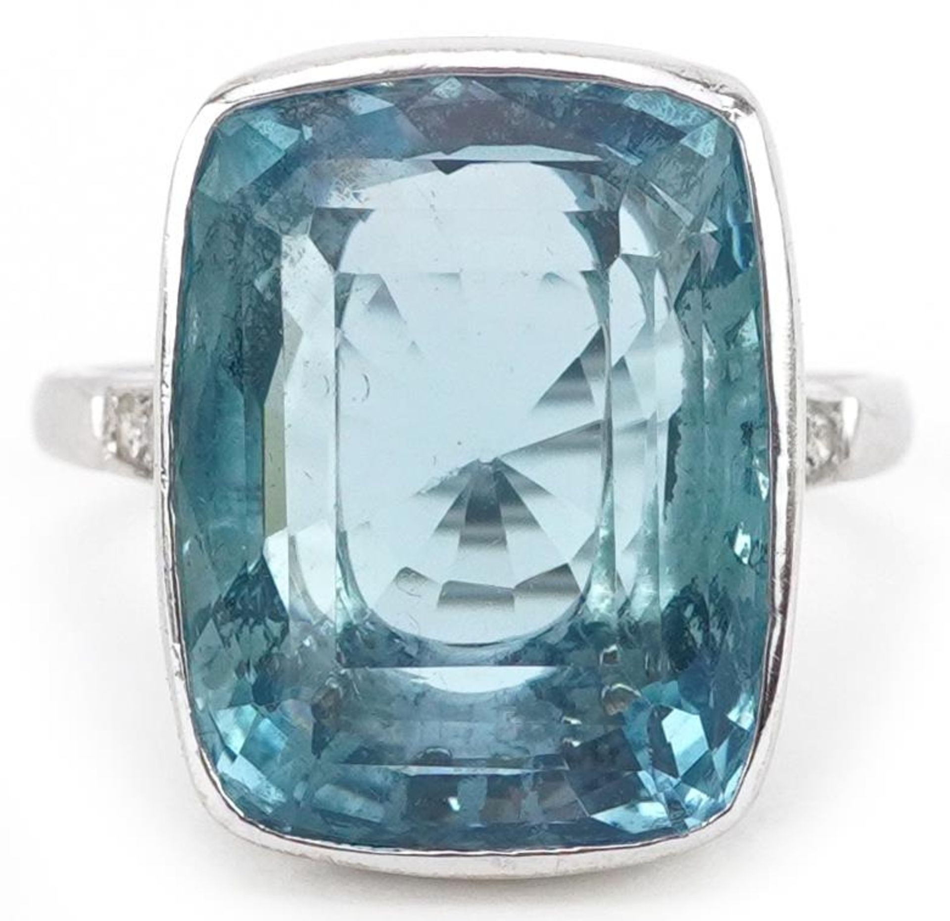 Art Deco style 18ct white gold aquamarine ring with diamond set shoulders, the aquamarine