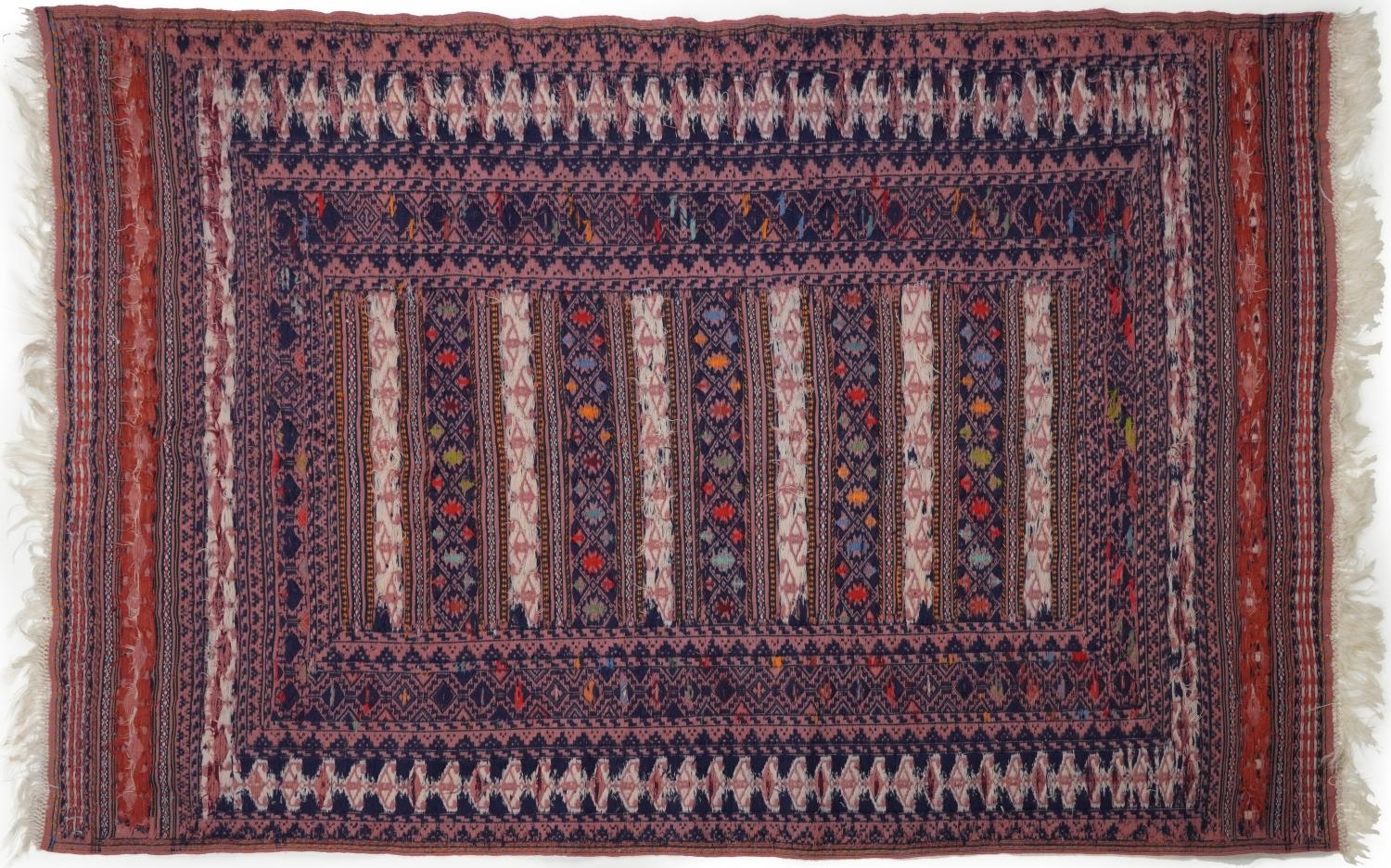 Rectangular Afghan red ground rug having an allover geometric design within corresponding borders, - Image 3 of 4