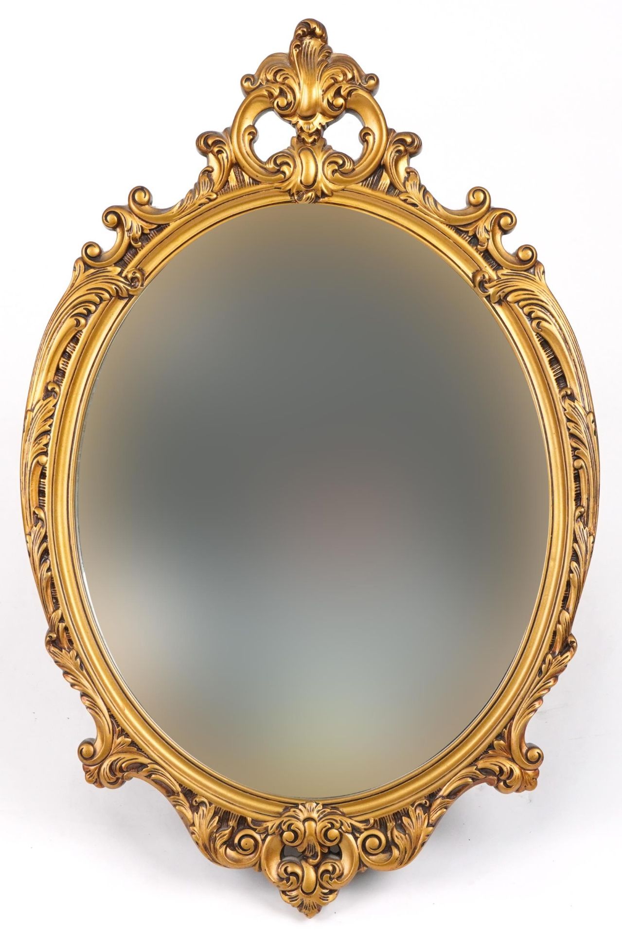 Ornate gilt framed oval wall mirror decorated with acanthus leaves, 72cm x 47cm