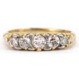 18ct gold graduated diamond five stone ring with ornate setting, total diamond weight