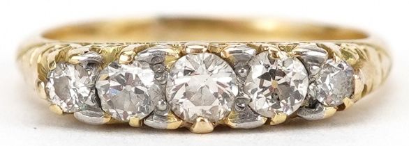 18ct gold graduated diamond five stone ring with ornate setting, total diamond weight