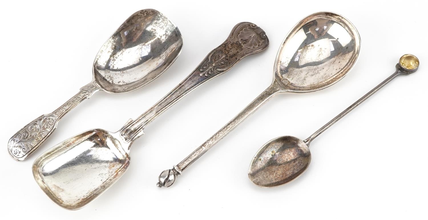 Four Victorian and later silver spoons including a caddy spoon and one with citrine terminal, the