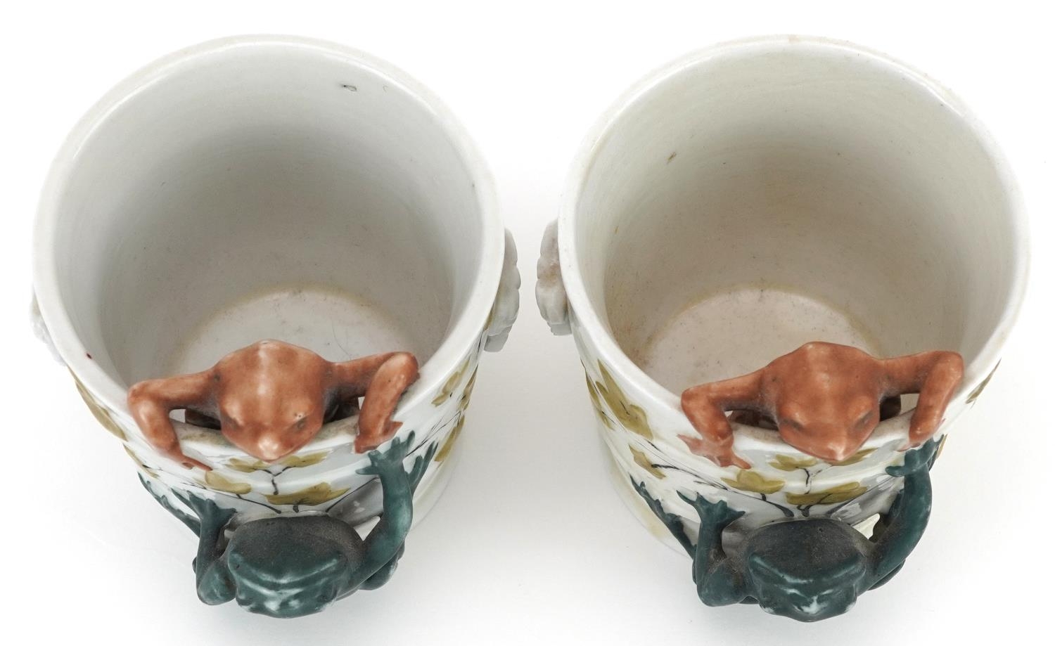 Pair of 19th century continental porcelain comical cache pots in the form of buckets mounted with - Image 2 of 4