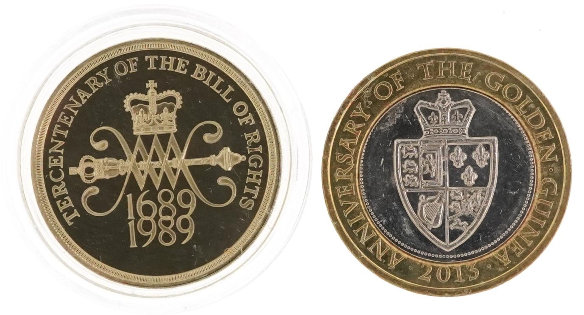 Two Elizabeth II two pound coins comprising 2013 Bi Metallic Anniversary of The Guinea with seven